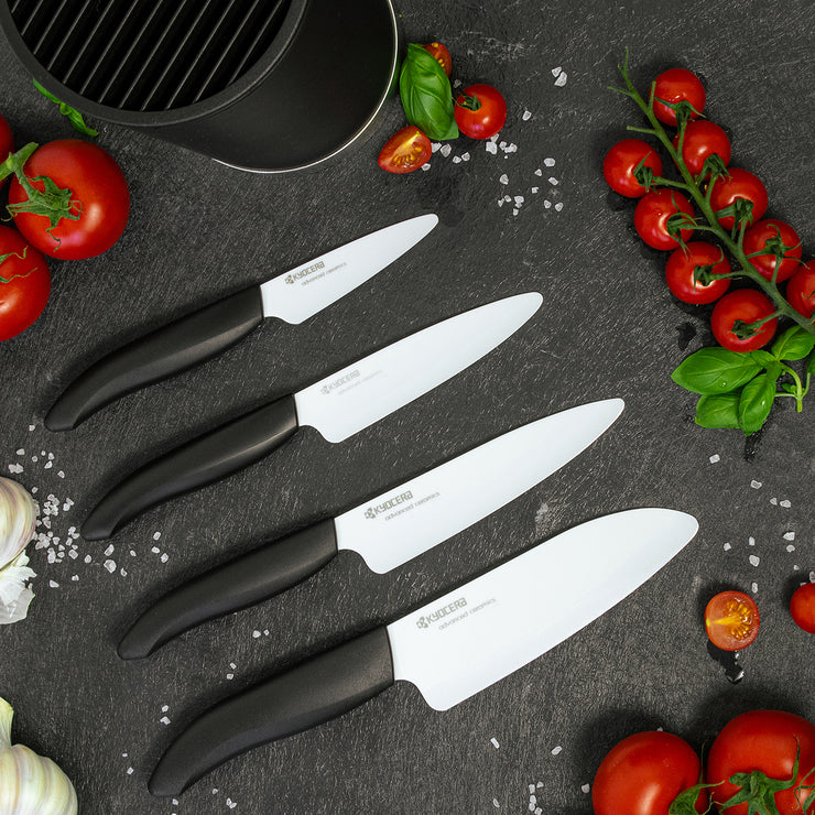 Round soft touch knife block including 4 GEN knives